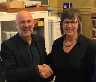 Retiring Chair Mike Wood congratulates Kath Broderick on her appointment as Chair of the Bibbulmun Track Foundation board.
