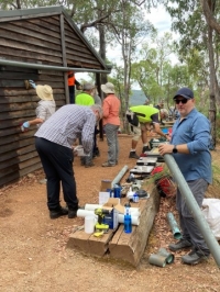Volunteers work on the shelter