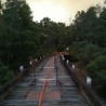 The bridge ready to be hosed down with smoke from the fire in the background.