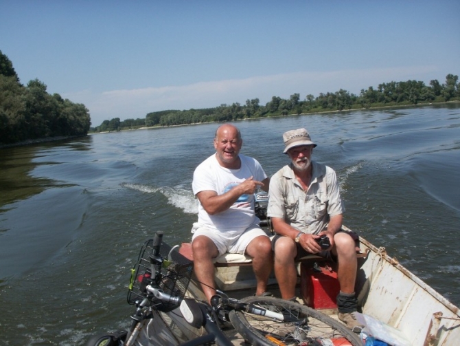 Ferryman and Peter crossing the Po.