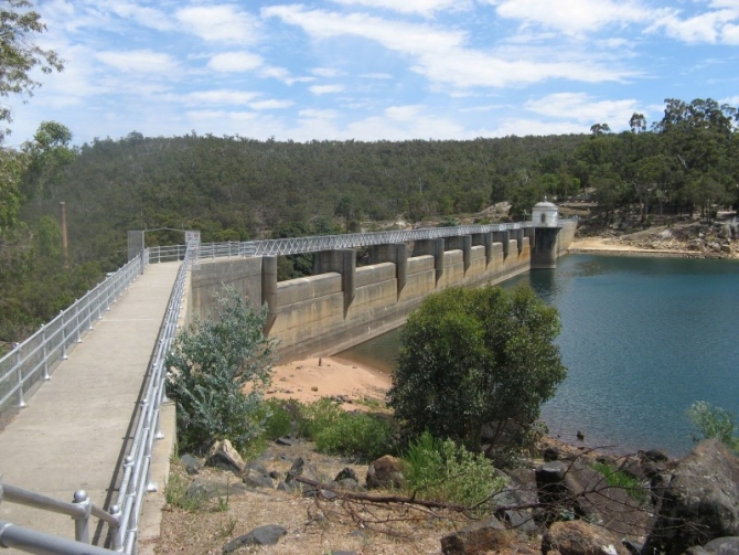 The Bibbulmun Track crosses the Mundaring Weir Wall.