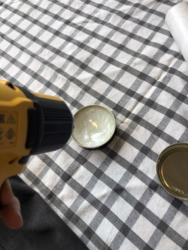 Heating wax slightly for easier application